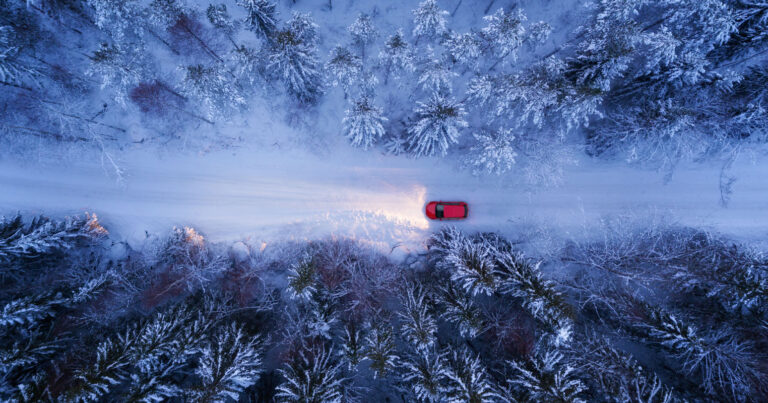 red_vehicle_snowy_road