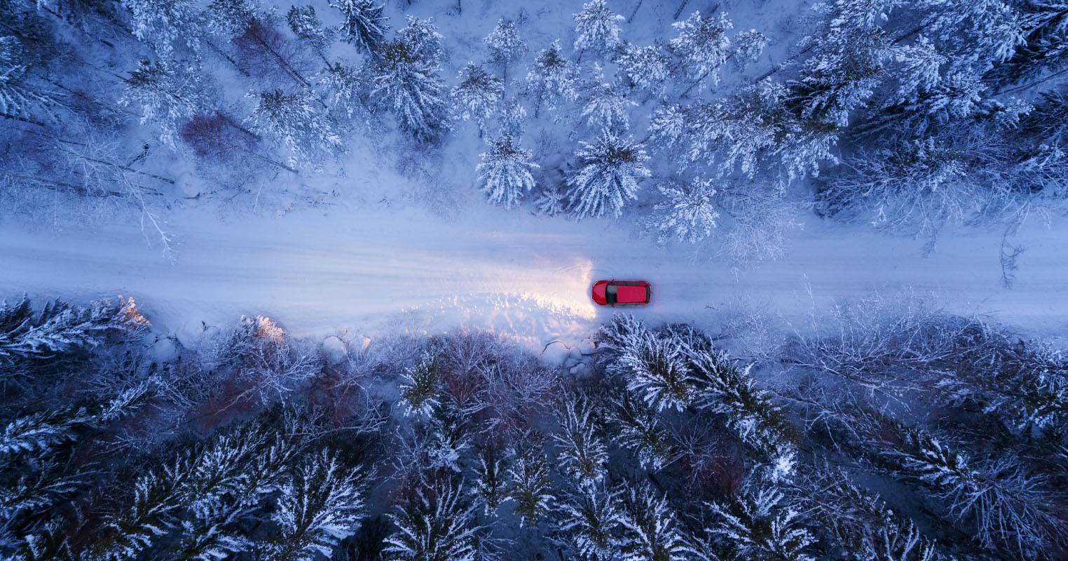 red_vehicle_snowy_road